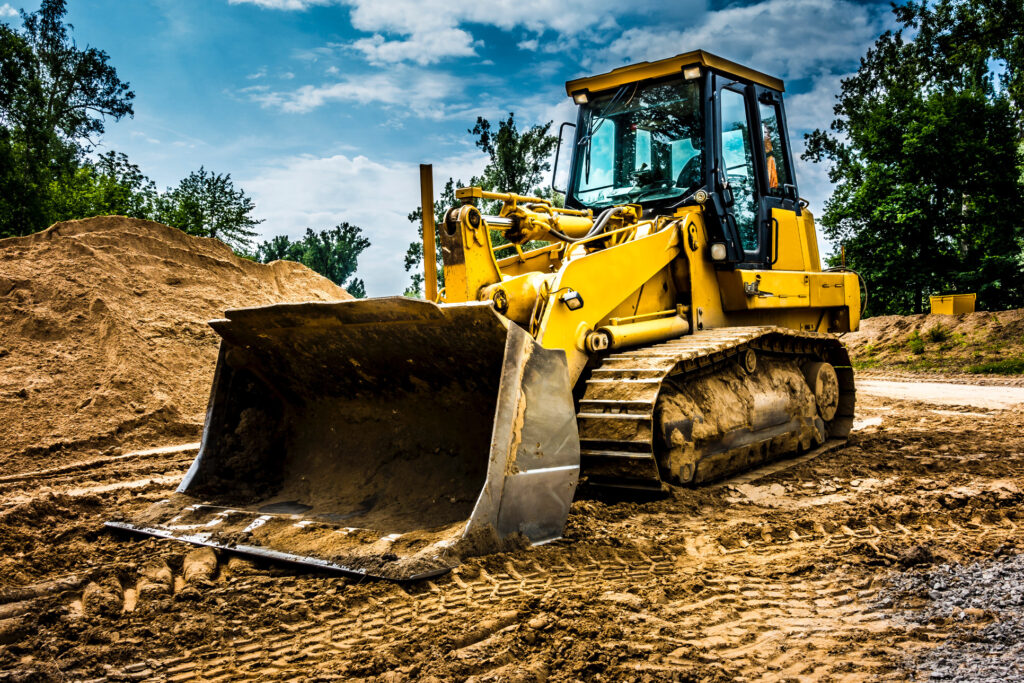 Bulldozer on cleared earth